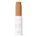 ColourPop Pretty Fresh Tinted Foundation Balm in Dark 17, open twist-up stick showing a warm deep tan shade, standing upright in a white tube with peach βPretty Freshβ lettering on a clean white background.