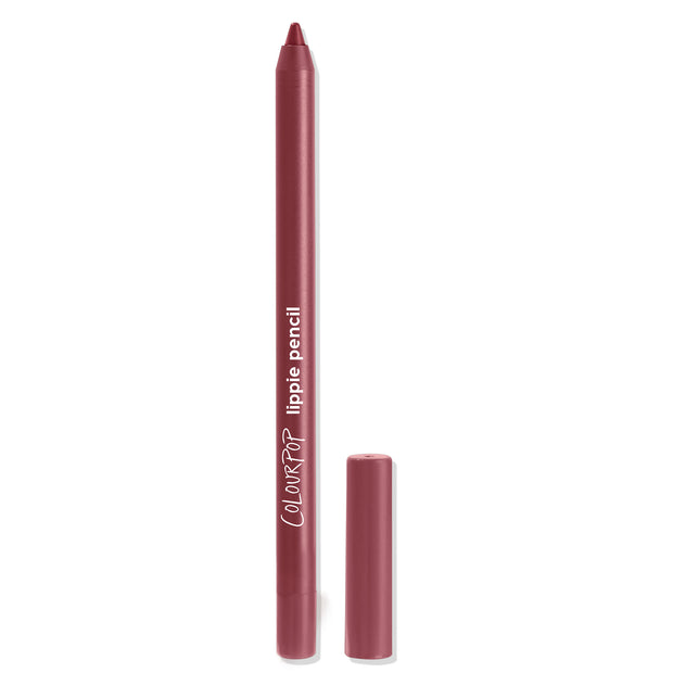 ColourPop Lippie Pencil Bounce stands upright with its cap off, revealing a sharpened rosy‑mauve tip; matte rose tube with white logo, cap set beside on a clean white background.
