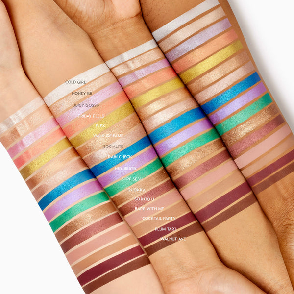Honey BB ColourPop Shadow Stix swatch shines as a warm honey‑gold shimmer, drawn in a single stripe on four forearms from light to deep skin tones, shown among labeled Shadow Stix shade swatches for easy color comparison.
