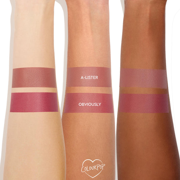 ColourPop Cream Blush “Obviously” swatched as rosy‑mauve bands on three forearms, shown beneath the “A-LISTER” shade for comparison; two horizontal stripes per arm display pigment and coverage with a ColourPop logo at the bottom.