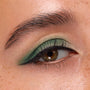 Hazel eye wears mint-to-emerald green shadow, showcasing the Just My Luck ColourPop Shadow Palette, with matte shades softly blended into a wing and paired with black liner in a tight beauty macro.