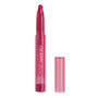 ColourPop Lippie Stix in I Heart This, a twist-up fuchsia lipstick crayon, stands uncapped with the angled bullet exposed while the translucent pink cap rests beside it on a white background.