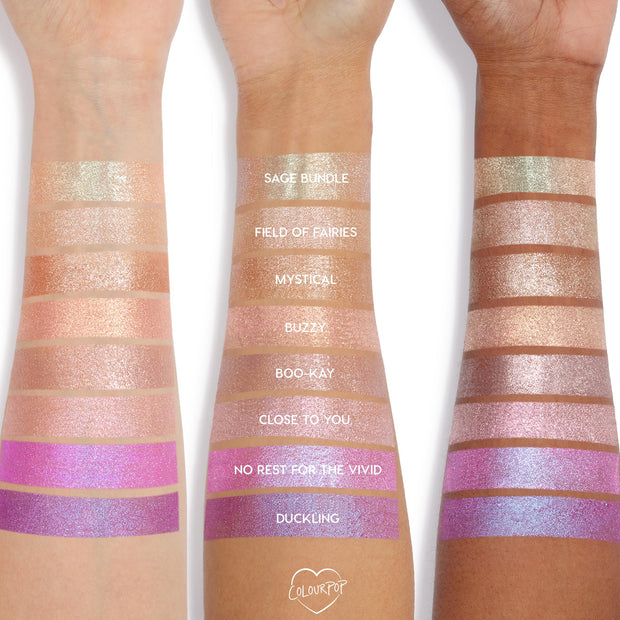 Super Cool Jelly Much Shadow eyeshadow by Colourpop swatched on three arms, showing shimmery pastel and vibrant shades from sage and champagne tones to bright pinks and purples, highlighting pigment and finish across multiple skin tones.