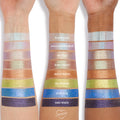 ColourPop Buzzy Jelly Much Shadow eyeshadow swatches shown in labeled, shimmering stripes on three arms of different skin tones, highlighting the vibrant multi-color payoff and metallic finish for US makeup lovers.