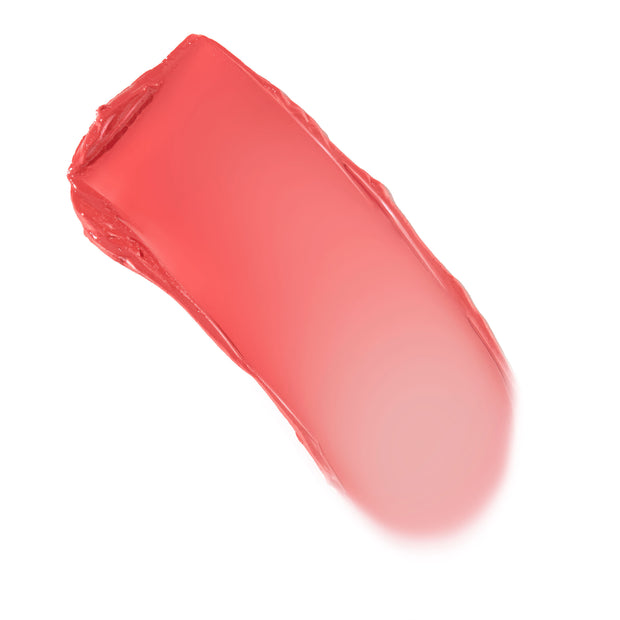 Creamy Baby Bunny Lip and Cheek Balm swatch glides diagonally across a white background, showing a warm coral-pink tint with a dewy, buildable finish - ColourPop Lip and Cheek Balm shade Baby Bunny for lips and cheeks.