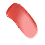 Creamy swipe of ColourPop Lip and Cheek Balm in Second Date, a warm coral‑pink swatch arcing on a white background, showing dewy, semi‑sheer, buildable coverage for multitasking lip and cheek color.