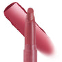ColourPop Lippie Stix Felt Cute stands uncapped with an angled rosy mauve bullet, a wide matching swatch swept behind on a white backdrop, showcasing the creamy pink lip color.