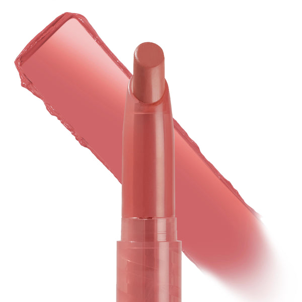 ColourPop Lippie Stix in NBD shows a creamy warm rosy nude, with the slim twist-up bullet front and a bold diagonal swatch demonstrating smooth color payoff on a clean white studio background.
