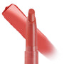 Topanga shade ColourPop Lippie Stix stands uncapped, showing a rosy coral bullet with a thick swipe of creamy pigment behind it, highlighting smooth, full-coverage payoff on a clean white background.