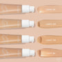 ColourPop Pretty Fresh Tinted Moisturizer, shade Light 8N, swatched in the bottom row beside Light 5N, 6W, and 7W, with three pump bottles laid horizontally on a peach background, highlighting its hyaluronic acid formula and light neutral tone.