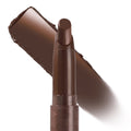 Oh, Behave ColourPop Lippie Stix lays down a creamy deep cocoa-brown swatch, with the slim twist-up bullet pictured beside the swipe on a white background.