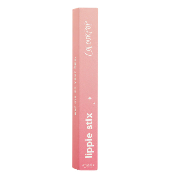 Oh, Behave ColourPop Lippie Stix standing upright, pink ombré rectangular box with white ColourPop branding, “lippie stix” lettering, and small sparkle icons, isolated on a clean white background.
