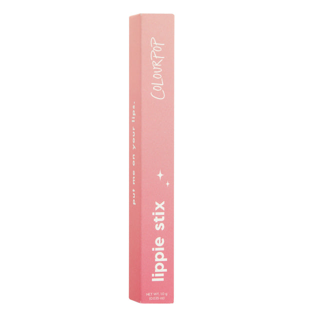 Oh, Behave ColourPop Lippie Stix standing upright, pink ombré rectangular box with white ColourPop branding, “lippie stix” lettering, and small sparkle icons, isolated on a clean white background.