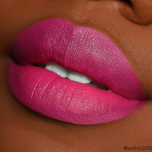 Fuchsia lips lined and filled with ColourPop Lippie Pencil Heart On, showcasing rich matte color, crisp edges, and full coverage in an extreme close-up on deep skin.