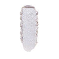 ColourPop Honeymoon Super Shock Highlighter swatch catching light as a long, oval smear of icy silver‑lavender shimmer with soft, crumbly edges, shown isolated on a clean white background.