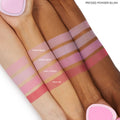 Woo Me pressed powder blush by ColourPop swatched on three arms, showing a rich rosy-pink stripe labeled “WOO ME” under Sweetheart, Cupid’s Bow, and Hot 2 Touch, demonstrating smooth pigment across light, medium, and deep skin tones.