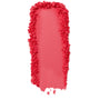 ColourPop Pressed Powder Blush Woo Me swatch - vibrant coral pink pigment swept in a thick vertical streak with a smooth center and crumbled edges, showing buildable payoff and texture on a clean white background.